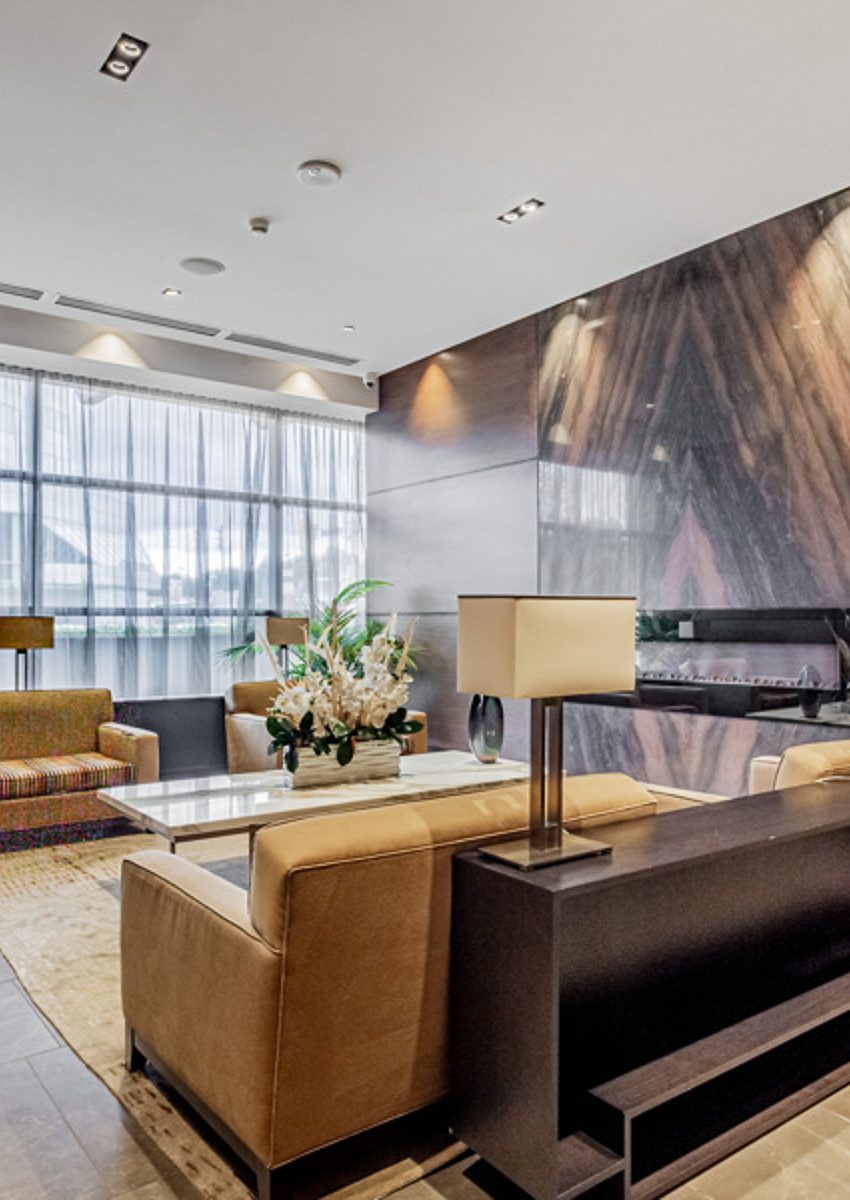 hullmark-centre-condos-2-anndale-dr-north-york-for-sale-lobby-sitting-area